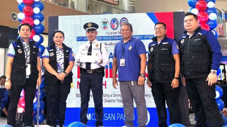       SG Hassan Pasco receives a Plaque of Recognition from CDRRMO